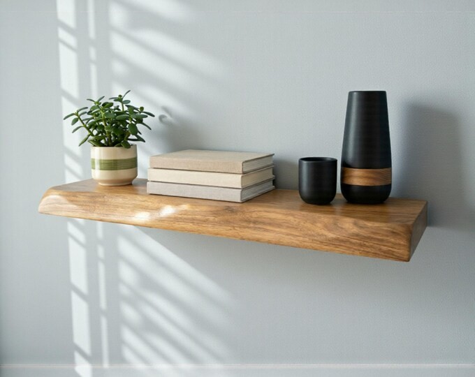 Art Deco floating shelf, geometric design, living room wall, gold accent finish.