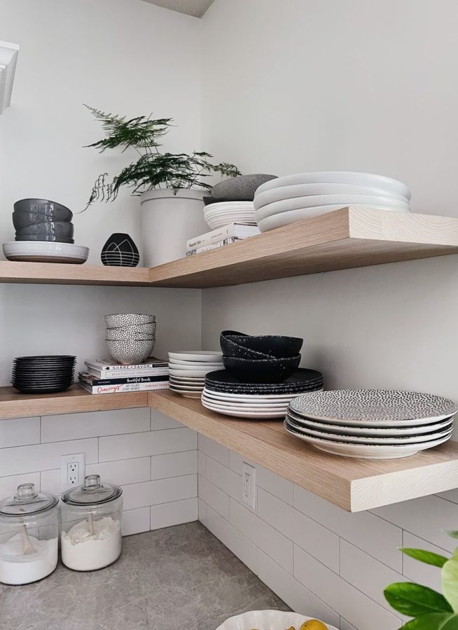 Floating shelf with metal rail, wood plank, hidden mounting, urban living‑room style