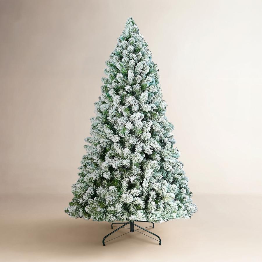 Frosted artificial fir tree, shimmering silver needles, stand base, wintery living room décor